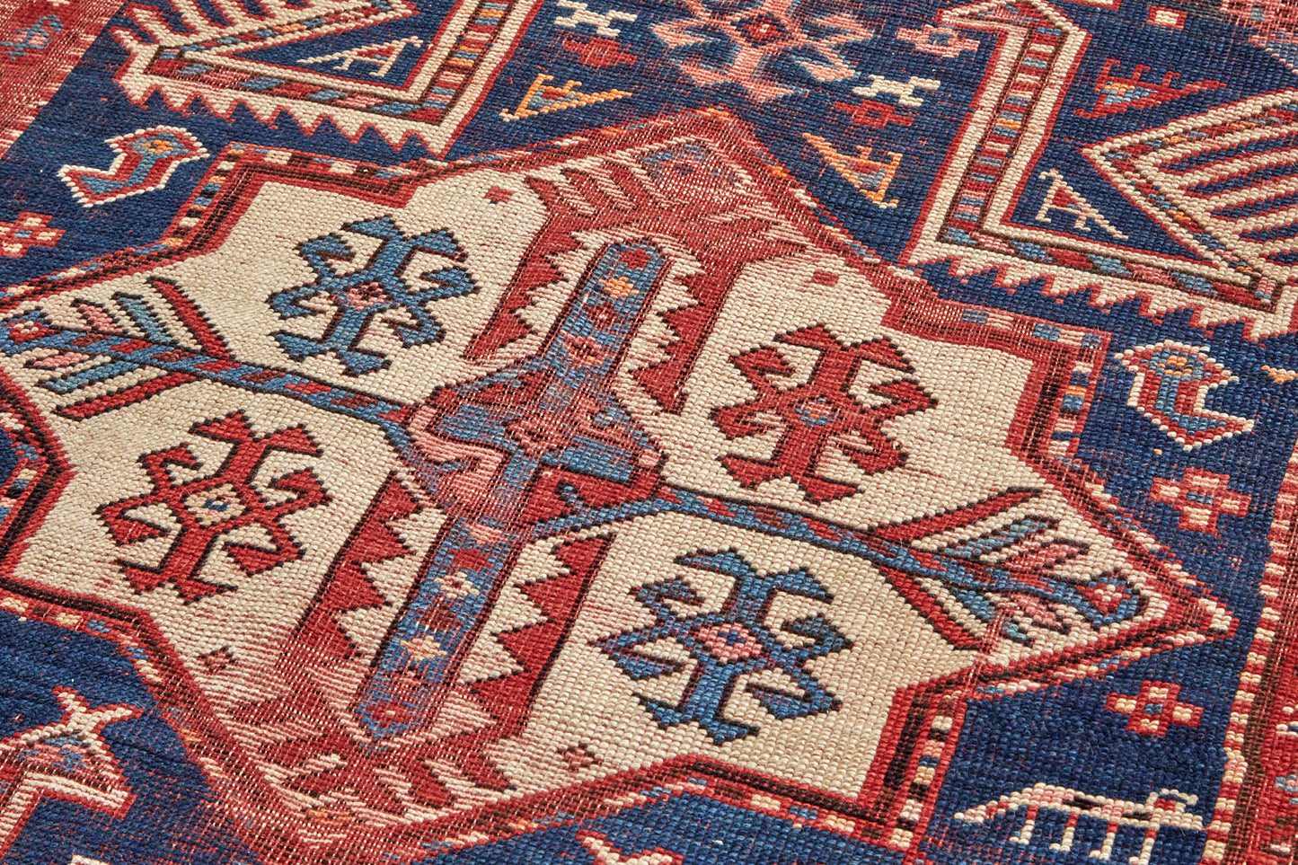 Antique hand woven Akstafa Persian Rug Runner - red, blue and cream with four medallions and bird shapes throughout - Available from King Kennedy Rugs Los Angeles 