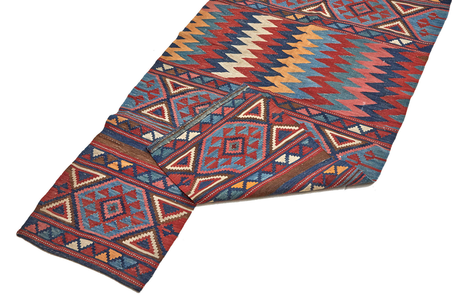 Multi-colored hand woven kilim Persian rug with zig zag and triangle designs - Available from King Kennedy Rugs Los Angeles
