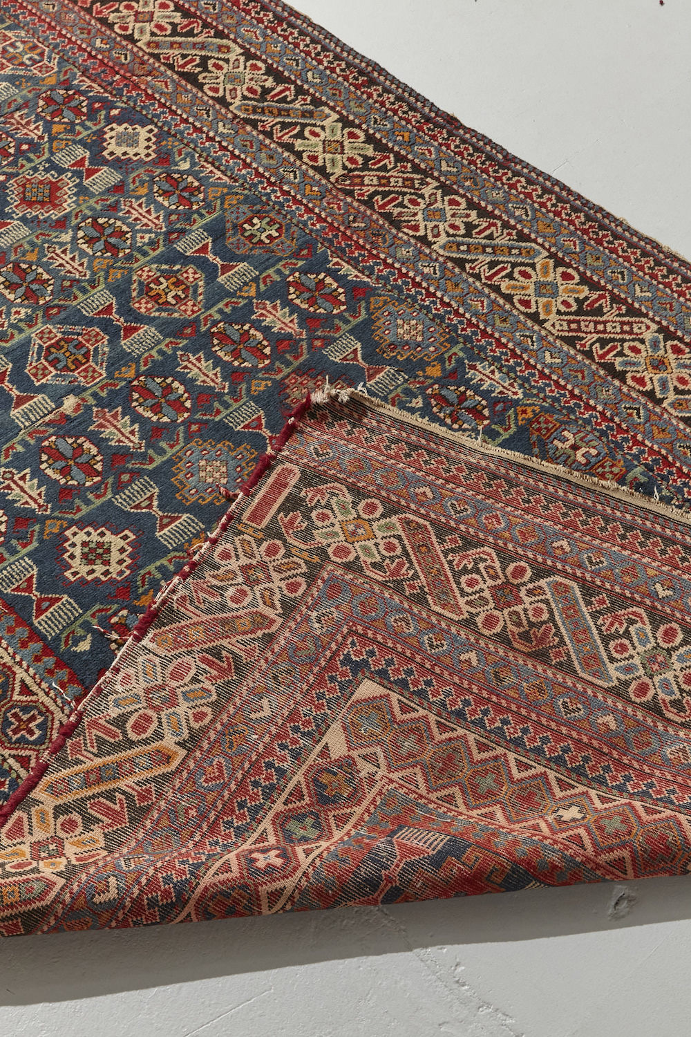 Chi chi antique Persian Rug runner with blue, red and cream designs intricately hand woven throughout, perfect for a hallway, living room or study - Available from King Kennedy Rugs Los Angeles