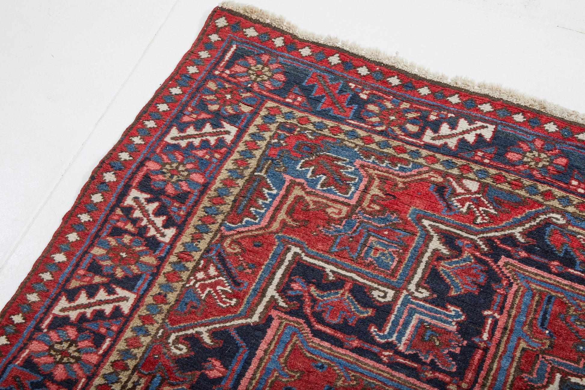 Red, Pink, Blue and White hand woven Heriz sampler Persian Rug - Available from King Kennedy Rugs Los Angeles