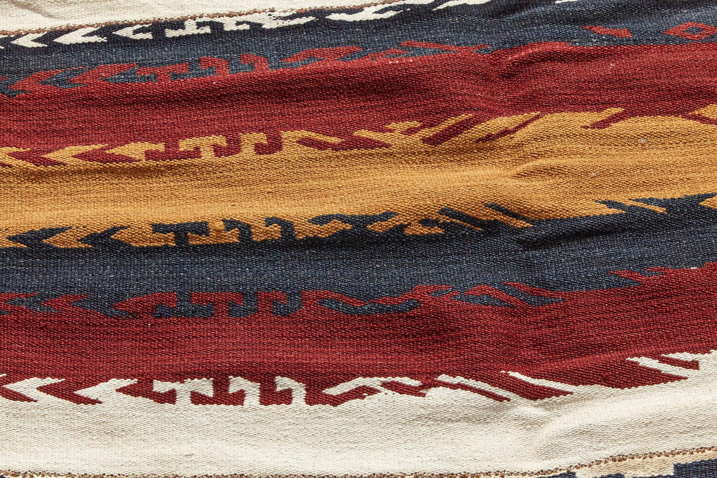 Detail of antique Kilim Turkish rug with red, grey, gold and cream stripes. Hand woven piece, perfect for a living room, bedroom or kitchen - Available from King Kennedy Rugs Los Angeles