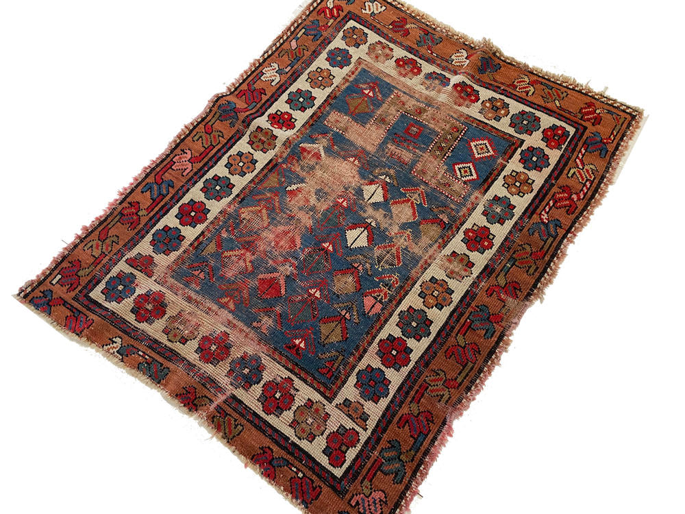Antique, well worn Shirvan Prayer Rug with blue center and cream and gold border with flowers and vines - hand woven - Available from King Kennedy Rugs Los Angeles