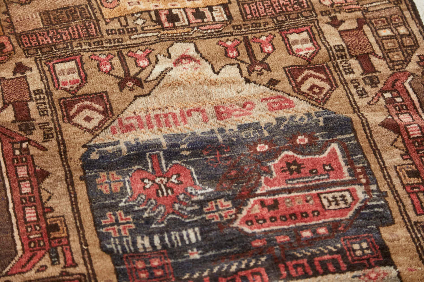 Vintage Afghan War Rug with earthy tones, tan base with brown and pink designs, beautiful details for office, kitchen or living room rug - Available from King Kennedy Rugs Los Angeles