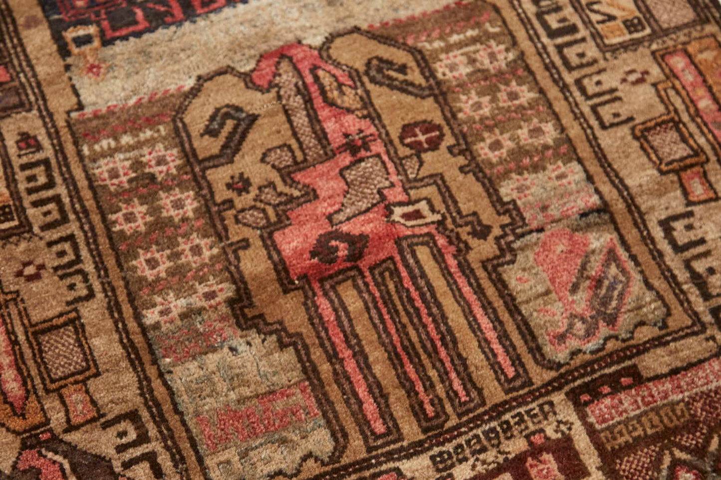 Vintage Afghan War Rug with earthy tones, tan base with brown and pink designs, beautiful details for office, kitchen or living room rug - Available from King Kennedy Rugs Los Angeles