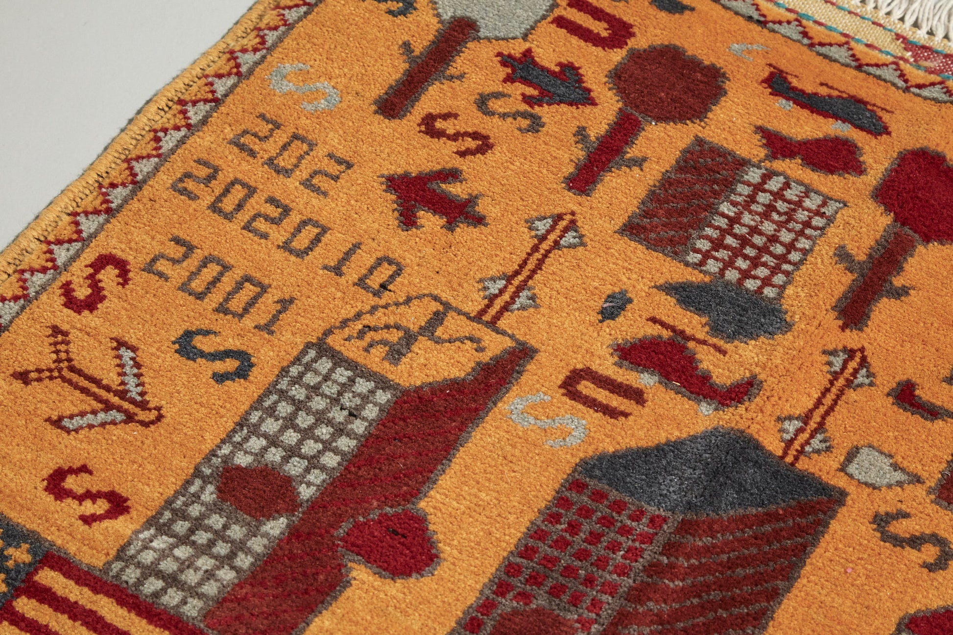 Afghan War Rug - Handwoven with images of twin towers, planes, helicopters available from King Kennedy Rugs Los Angeles