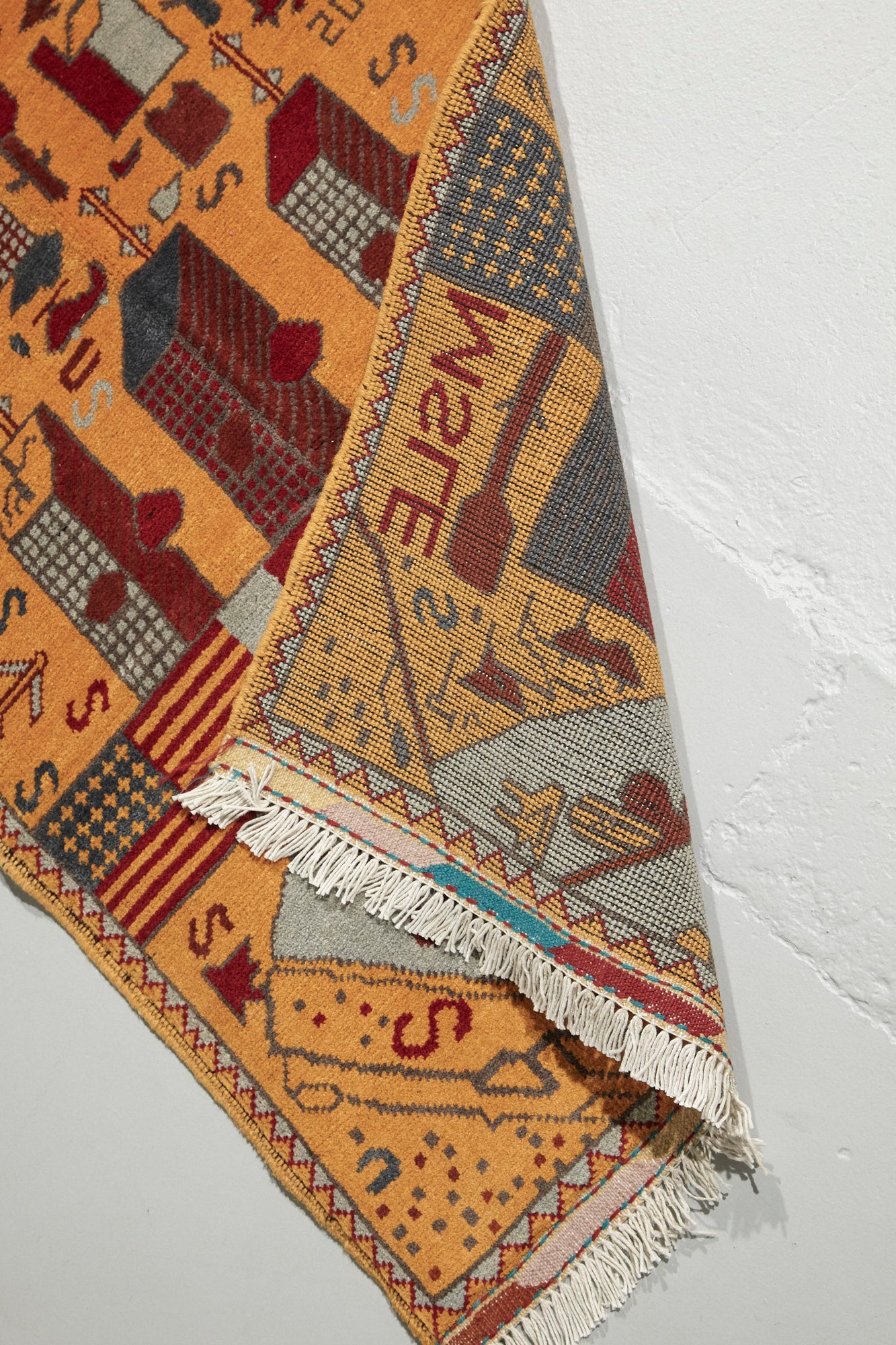 Afghan War Rug - Handwoven with images of twin towers, planes, helicopters available from King Kennedy Rugs Los Angeles