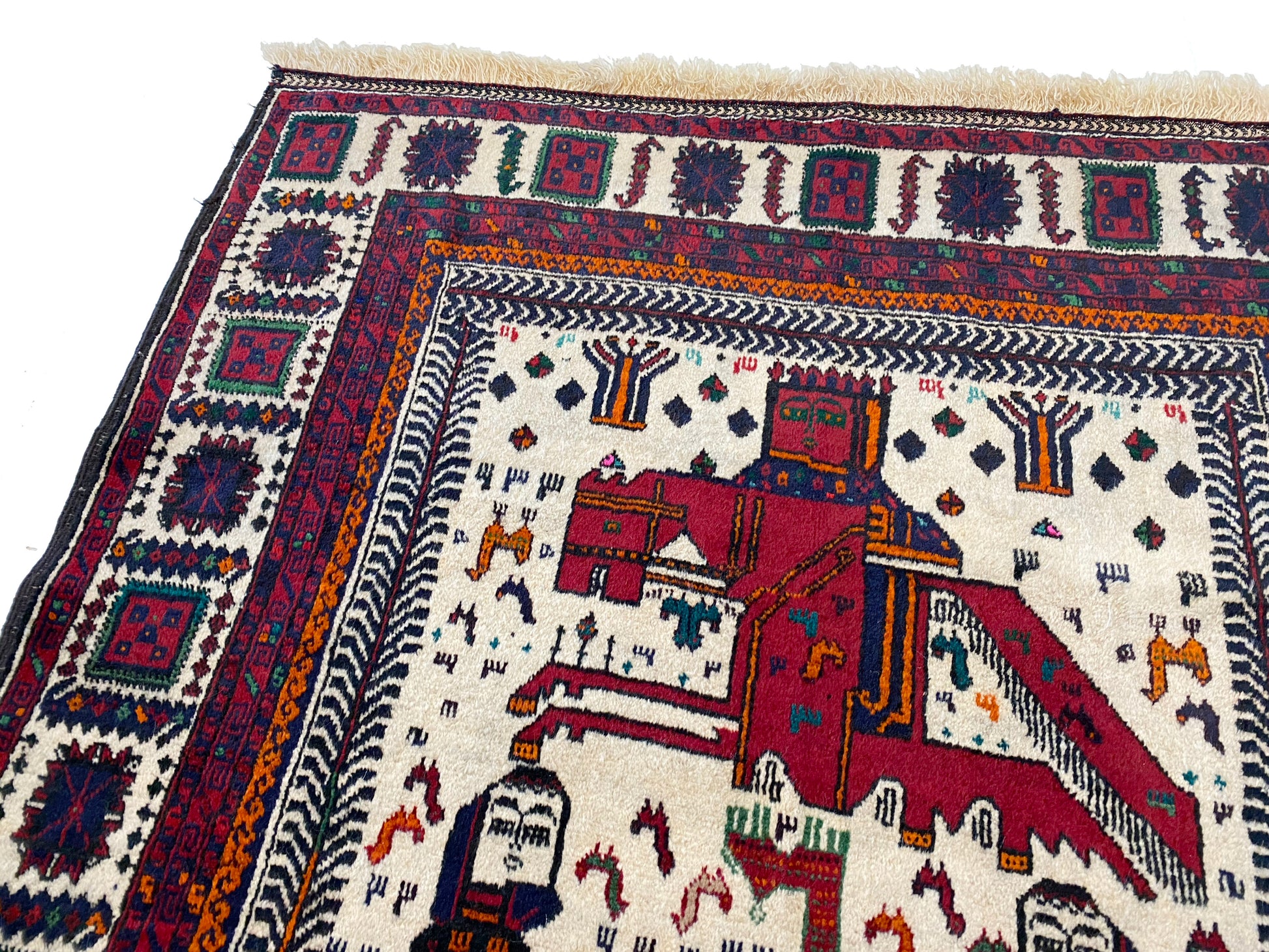 Afghan pictorial rug with cream base and three figures in blue cloaks across the middle, figures with crowns on horses at the top and bottom of rug woven in deep blue and reds