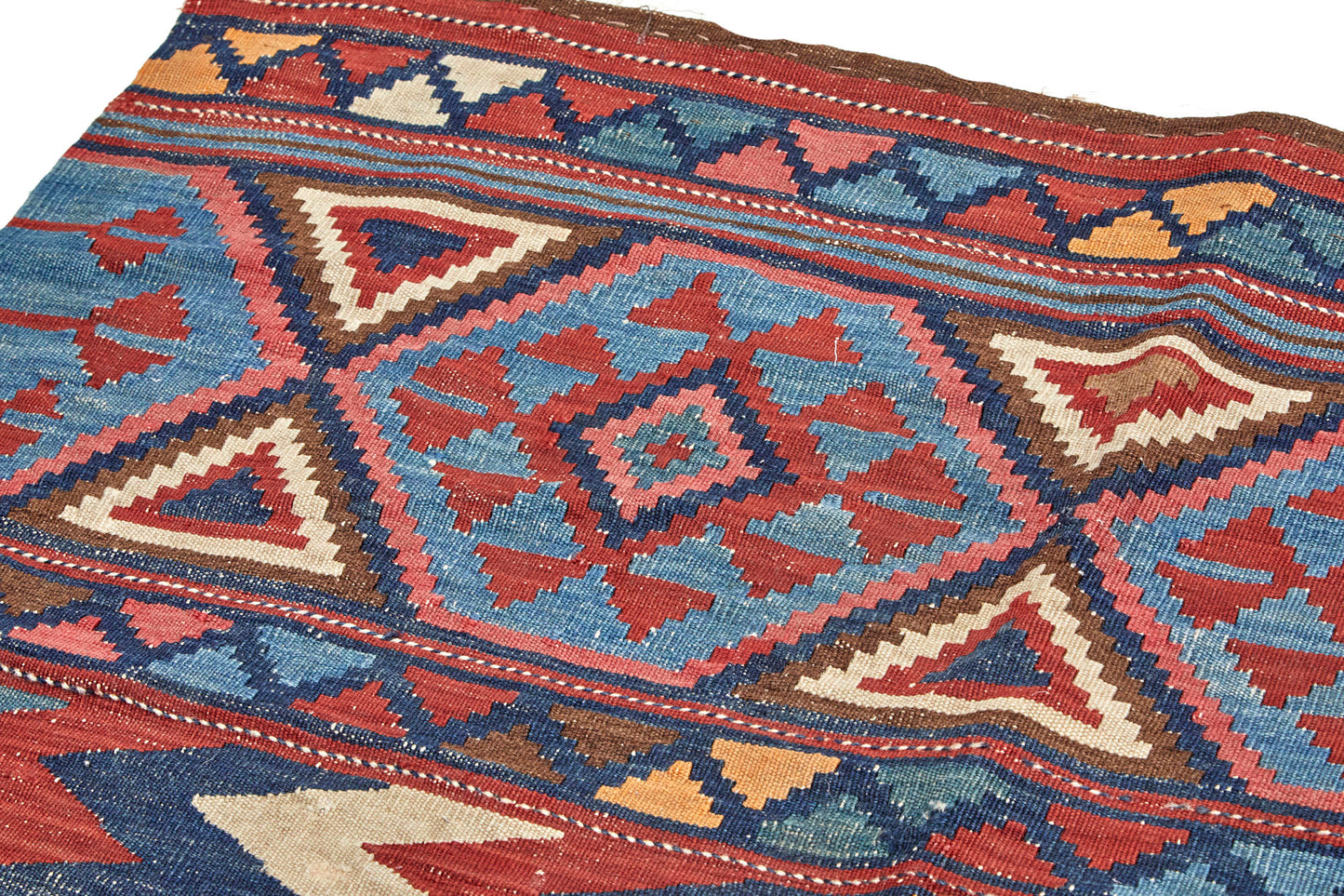 Multi-colored hand woven kilim Persian rug with zig zag and triangle designs - Available from King Kennedy Rugs Los Angeles 