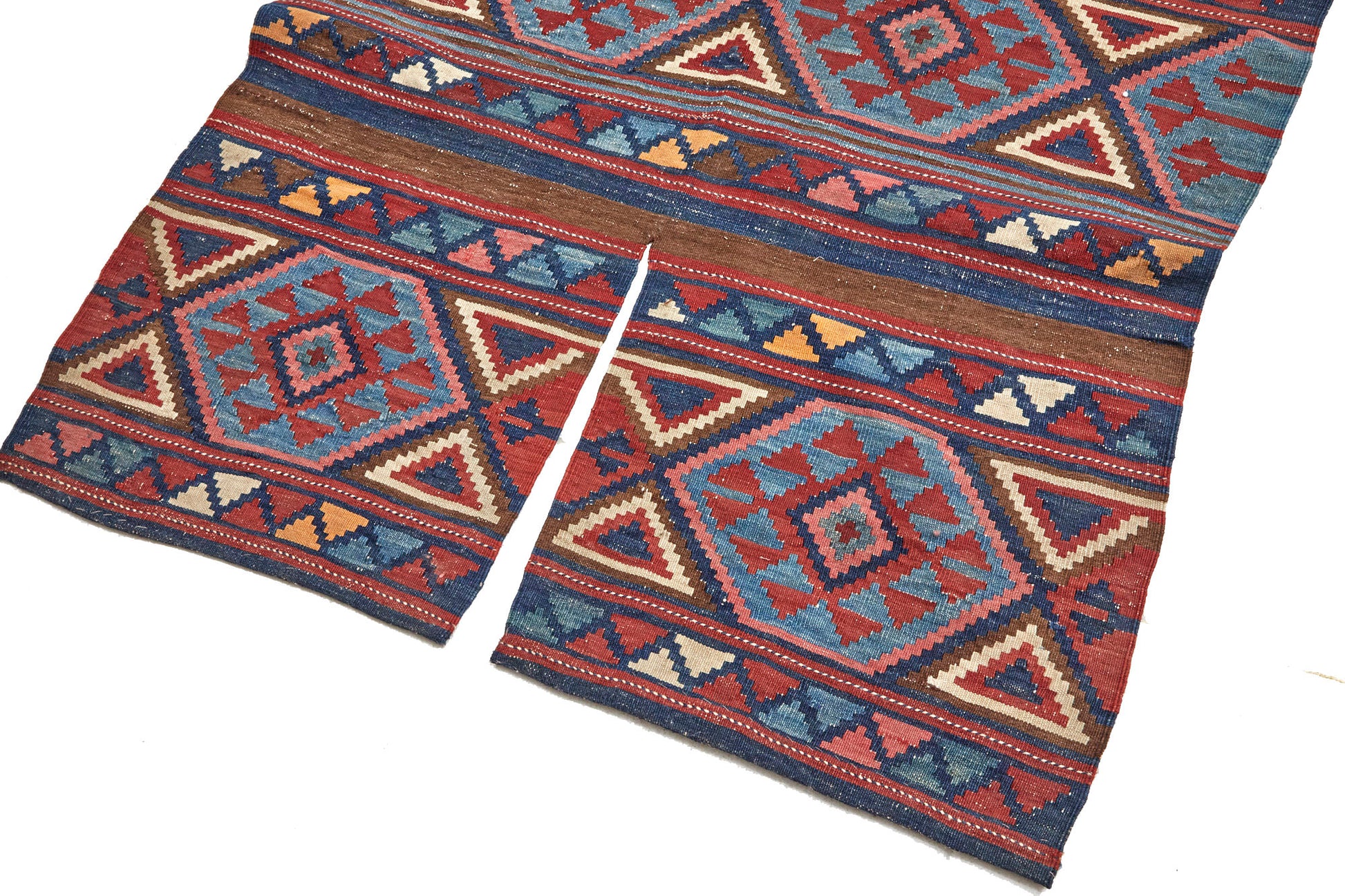 Multi-colored hand woven kilim Persian rug with zig zag and triangle designs - Available from King Kennedy Rugs Los Angeles 