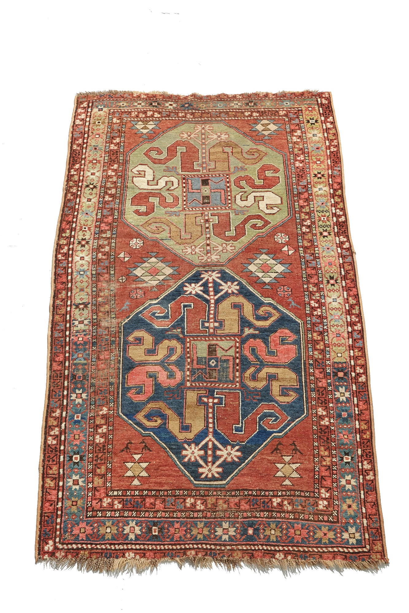 Kazak Cloudband antique Persian rug with rich pink base and two large medallion designs in the center, one pale green, one blue with pink, red, gold, cream and blue designs intricately hand woven throughout. A beautiful piece for a bedroom, hallway, dining room or study - Available from King Kennedy Rugs Los Angeles
