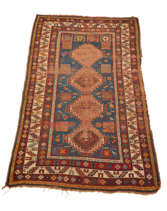 Hand woven antique Kazak Persian Rug - Blue base with red, cream and gold border - Available from King Kennedy Rugs Los Angeles