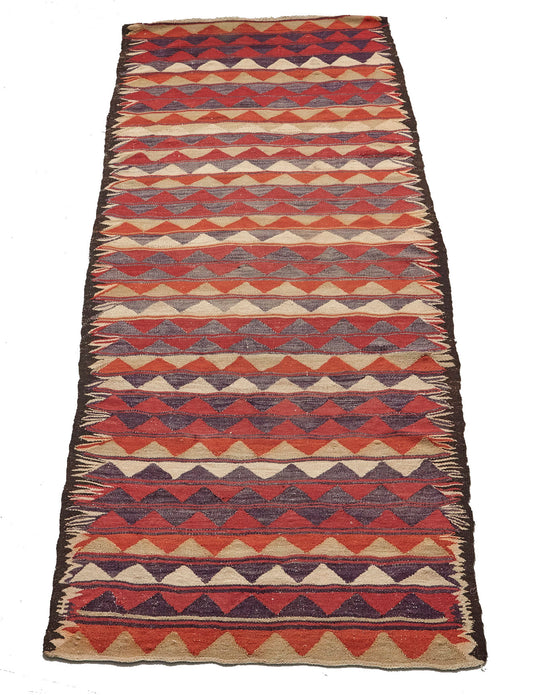 Hand woven flat weave Kilim Turkish Rug with beige, red and grey triangle shapes - Perfect for bedroom, kitchen, dining or living room rug - Available from King Kennedy Rugs Los Angeles
