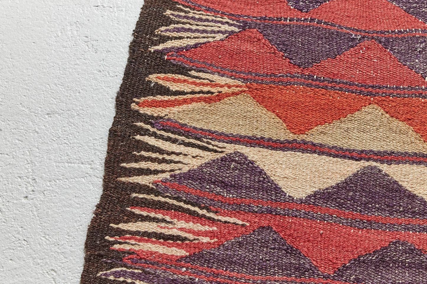 Hand woven flat weave Kilim with beige, red and grey triangle shapes - Perfect for bedroom, kitchen, dining or living room rug - Available from King Kennedy Rugs Los Angeles