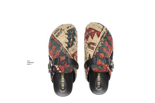 King Kennedy Rug Mules are one-of-a-kind and made of 100 year old antique Persian rug fragments with soft lambskin footbed and comfortable rubber sole. This pair is made of an antique Persian rug with cream, pink and teal designs. 