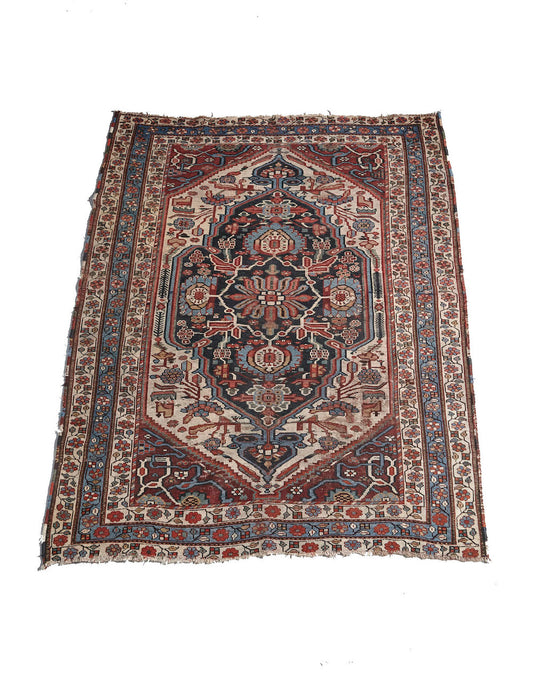 Antique Persian Bakhtiari hand woven rug with blue, red and cream floral design. Perfect for dining room, living room or office. Available from King Kennedy Rugs Los Angeles