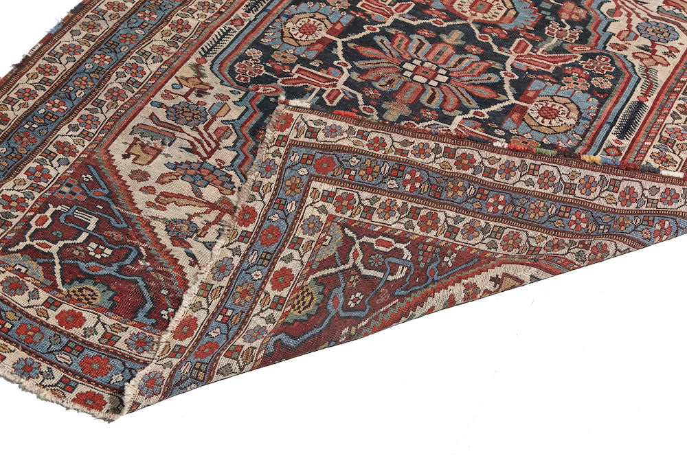Front and back of rug - Antique Persian Bakhtiari hand woven rug with blue, red and cream floral design. Perfect for dining room, living room or office. Available from King Kennedy Rugs Los Angeles
