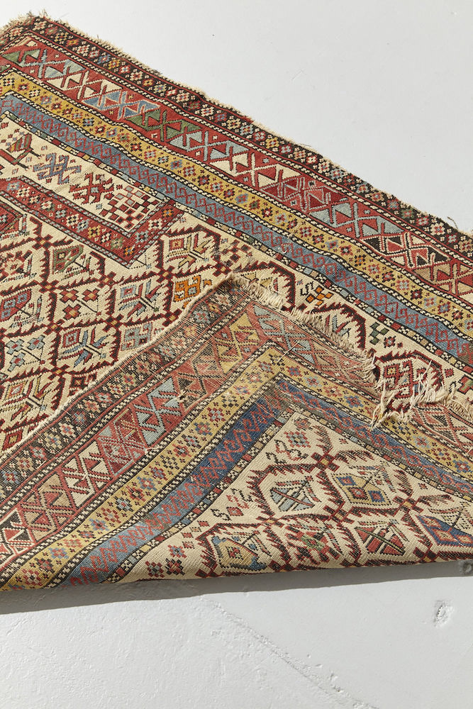 Front and back of Shirvan Persian Prayer Rug. Intricately woven in beige, gold, green, blue and red with floral plant designs throughout. Perfect for a bedroom, study, bathroom or kitchen rug - Available from King Kennedy Rugs Los Angeles
