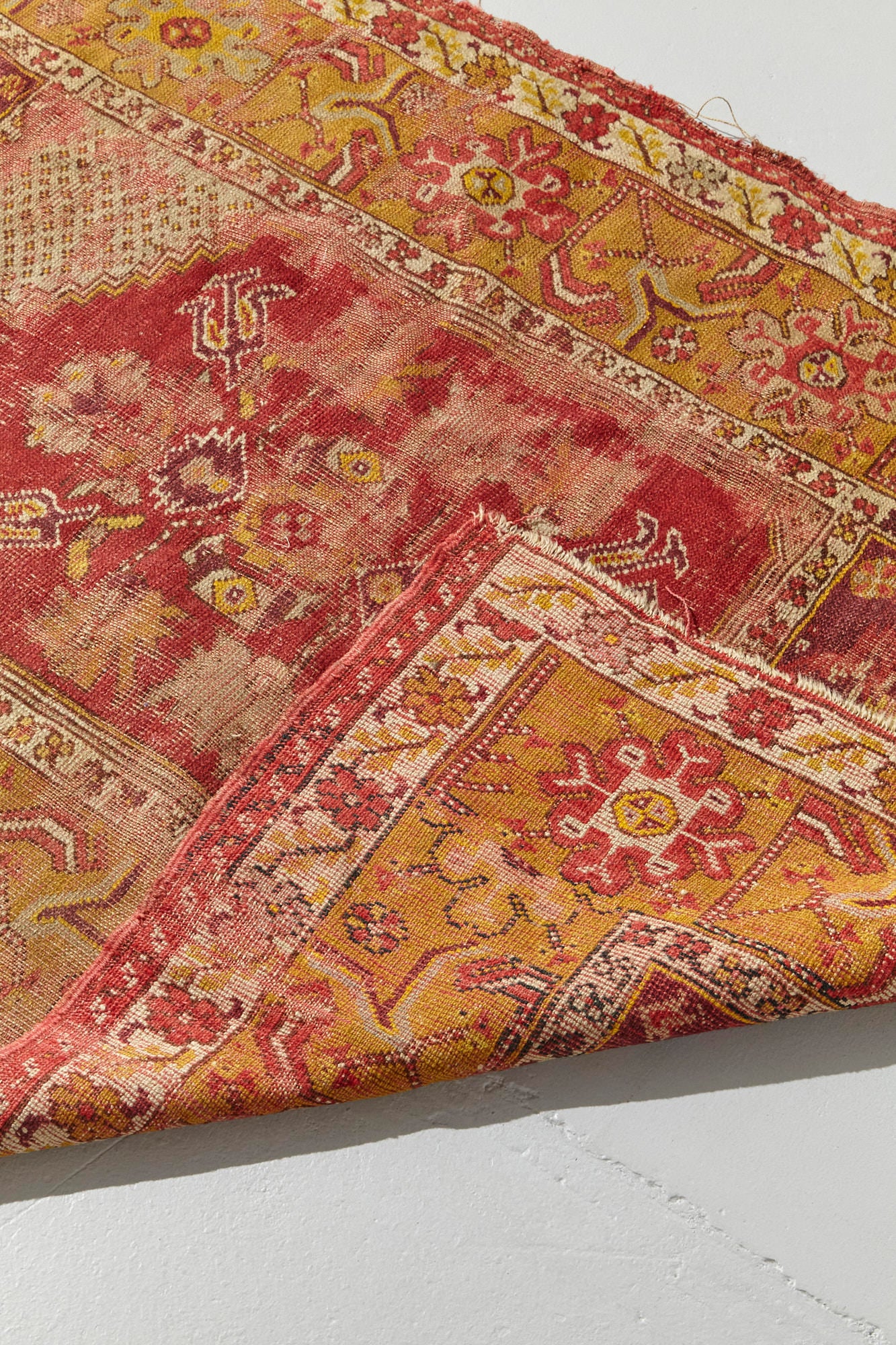 Antique Turkish Prayer Rug, hand woven in red and gold, perfect for a bed room, study or kitchen rug - Available from King Kennedy Rugs Los Angeles