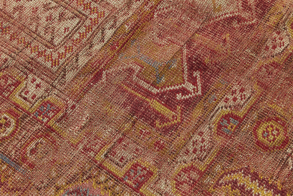 Intricately woven antique Turkish Prayer rug in red, yellow and beige. Perfect for a kitchen, bathroom or study rug - Available from King Kennedy Rugs Los Angeles