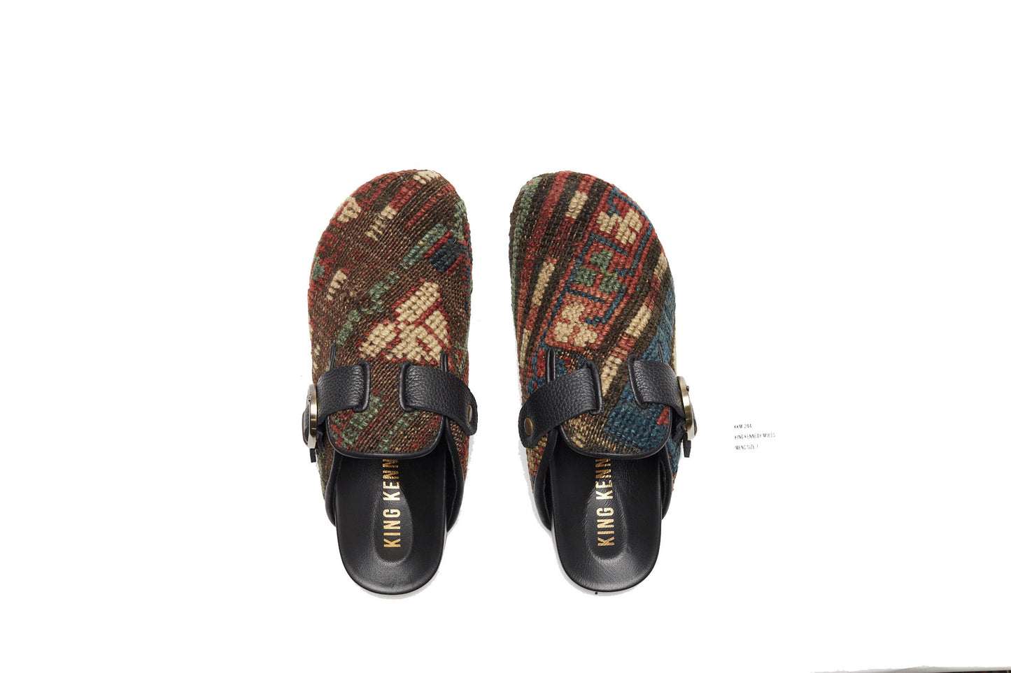 King Kennedy Rug Mules are one-of-a-kind and made of 100 year old antique Persian rug fragments with soft lambskin footbed and rubber sole. This pair is made of an antique Persian rug with patterns in deep earth tones of brown, green, cream and blue. Made in Los Angeles.