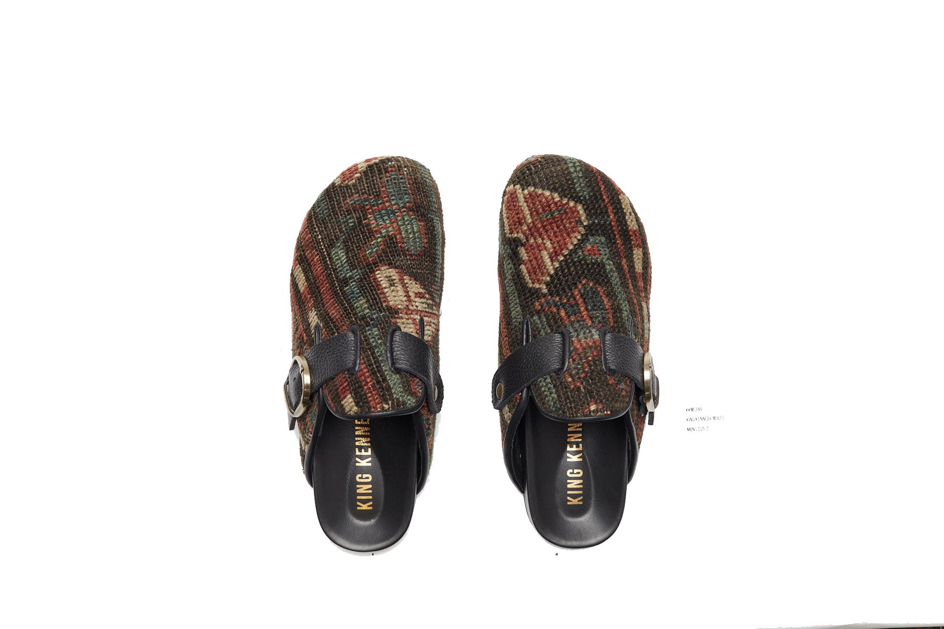 King Kennedy Rug Mules are one-of-a-kind and made of 100 year old antique Persian rug fragments with soft lambskin footbed and rubber sole. This pair is made of an antique Persian rug with patterns in deep earth tones of brown, green, cream and pale red. Made in Los Angeles.