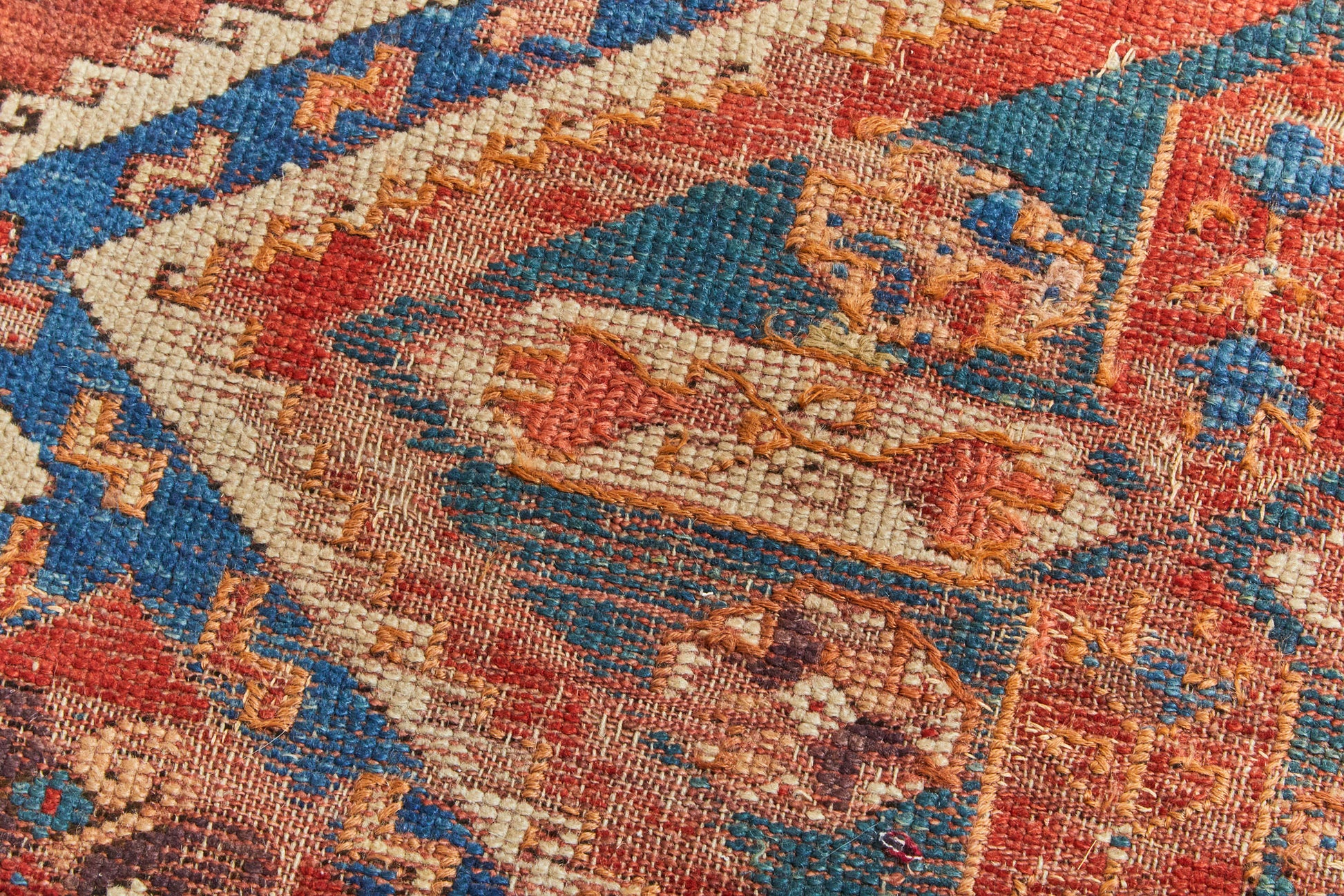 Antique hand woven Persian Rug, Caucasian Rug - Red, cream and blue weaving with crosses, medallions and zigzags available from King Kennedy Rugs Los Angeles