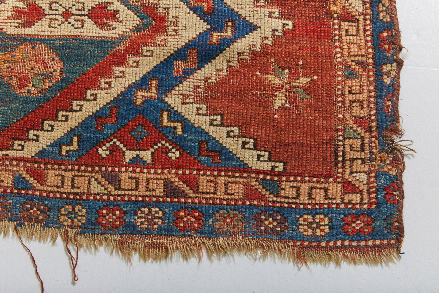 Antique hand woven Persian Rug, Caucasian Rug - Red, cream and blue weaving with crosses, medallions and zigzags available from King Kennedy Rugs Los Angeles