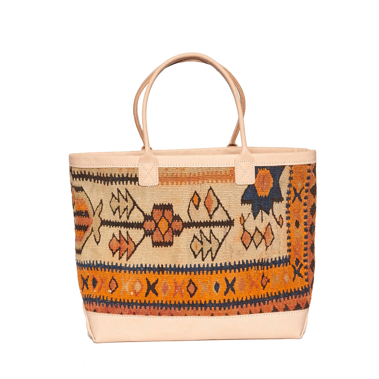 One of a kind King Kennedy Rug tote with orange, cream, blue floral flatweave pattern. With pale beige leather handle and boot. Perfect for running around the city all day or a jaunt to the farmers market