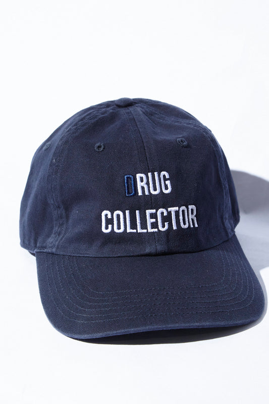 Navy blue baseball hat with (d) Rug Collector embroidered 