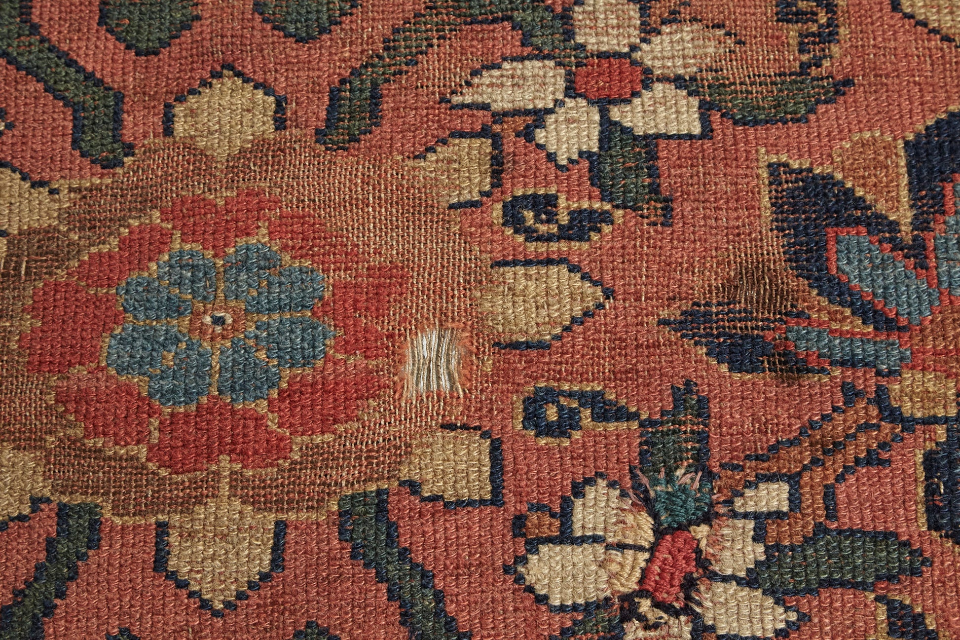 Vintage Floral Mahal Sampler Runner Rug - Pale pink with cream medallion in the center and blue flowers throughout - Available from King Kennedy Rugs Los Angeles - detail of antique rug condition 